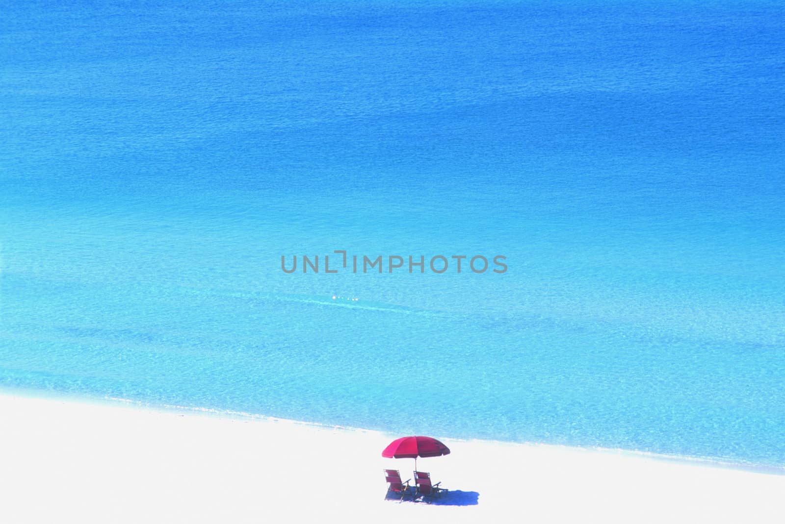 umbrella and chairs on beach Destine Florida by hotflash2001