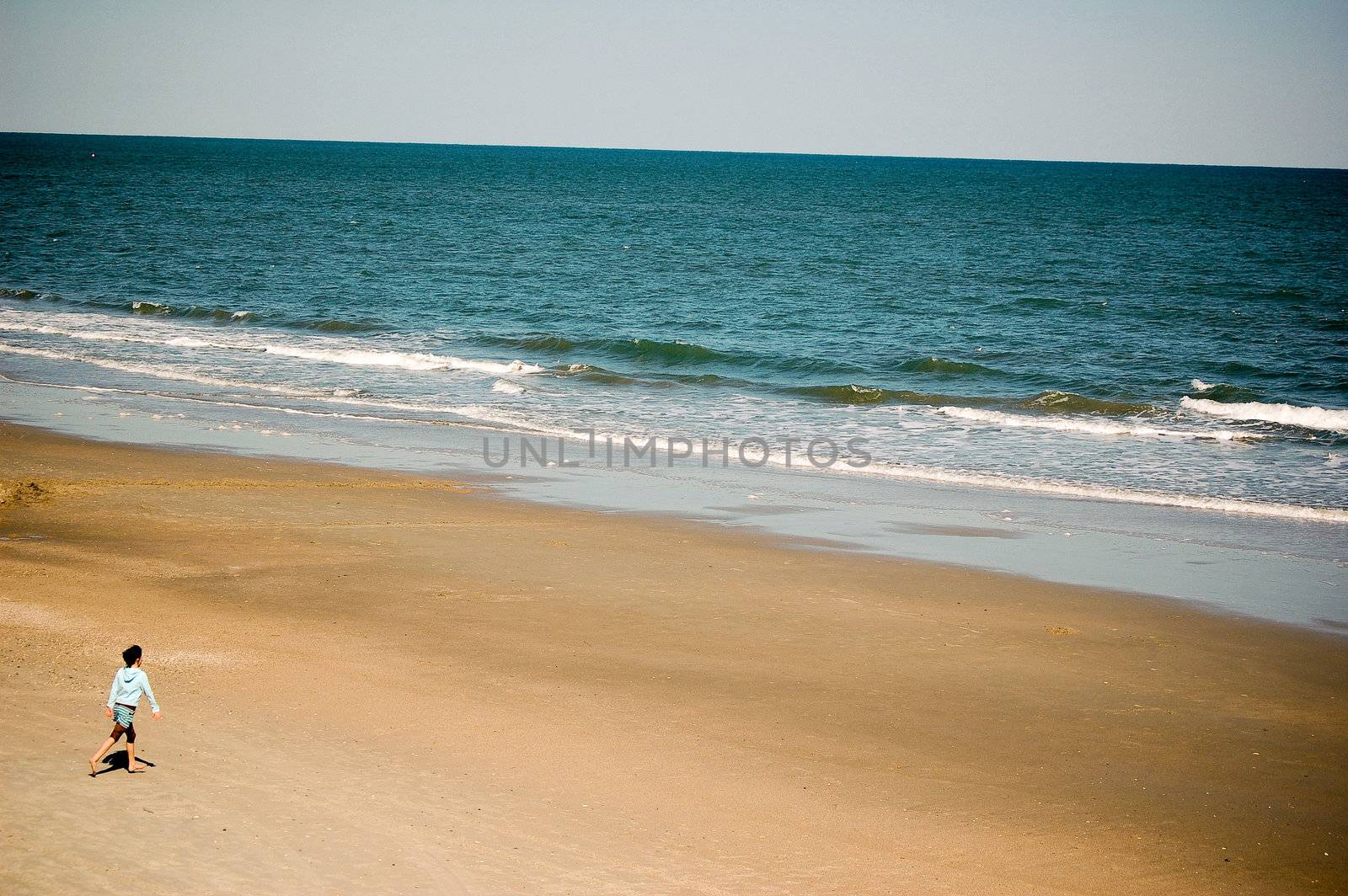 Running Toward the Beach - Presentation Background by RefocusPhoto