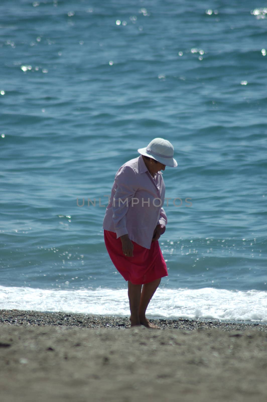 Woman on beach by khanga
