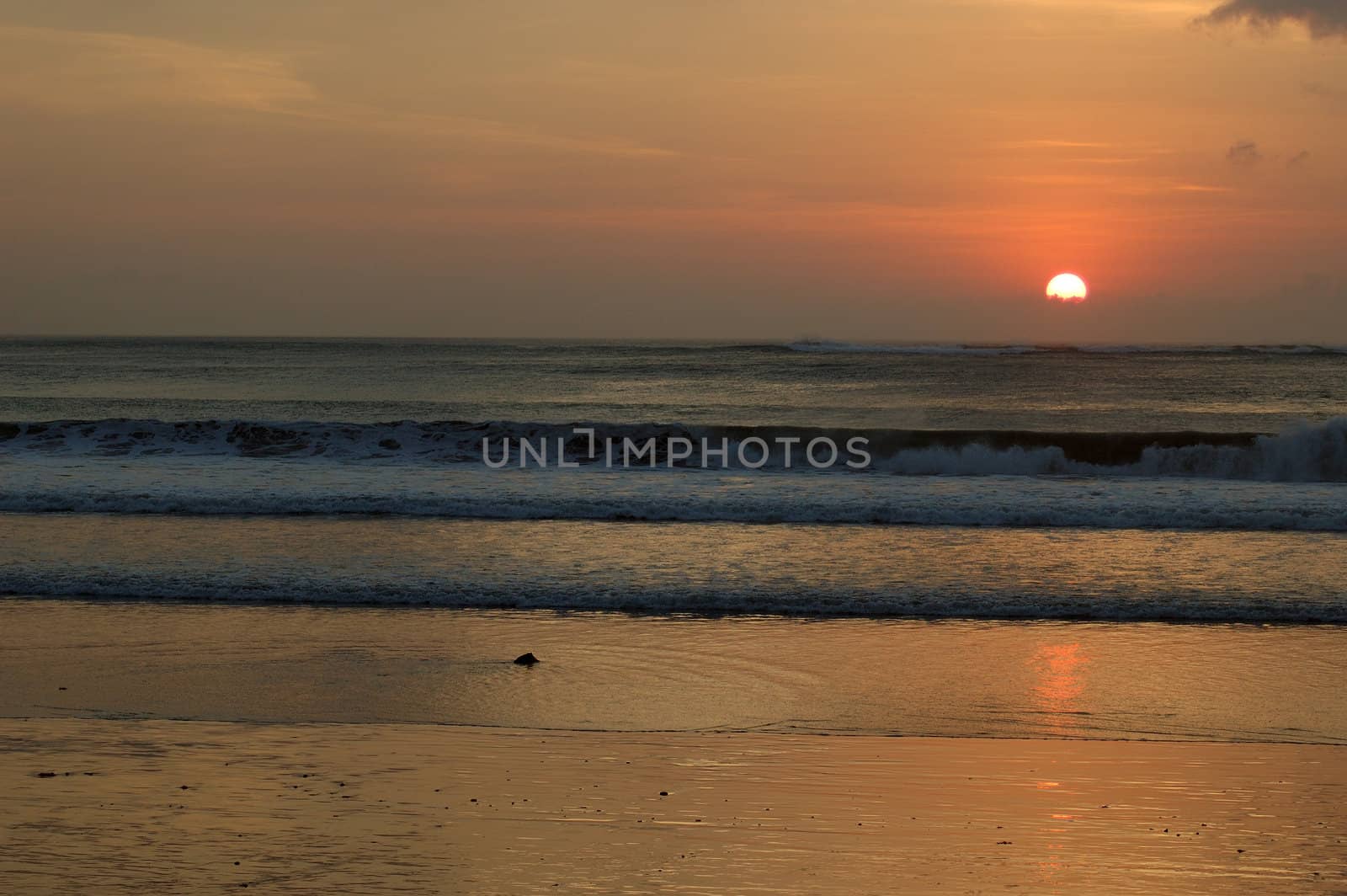 Sunset in Kuta, Bali, Indonesia.