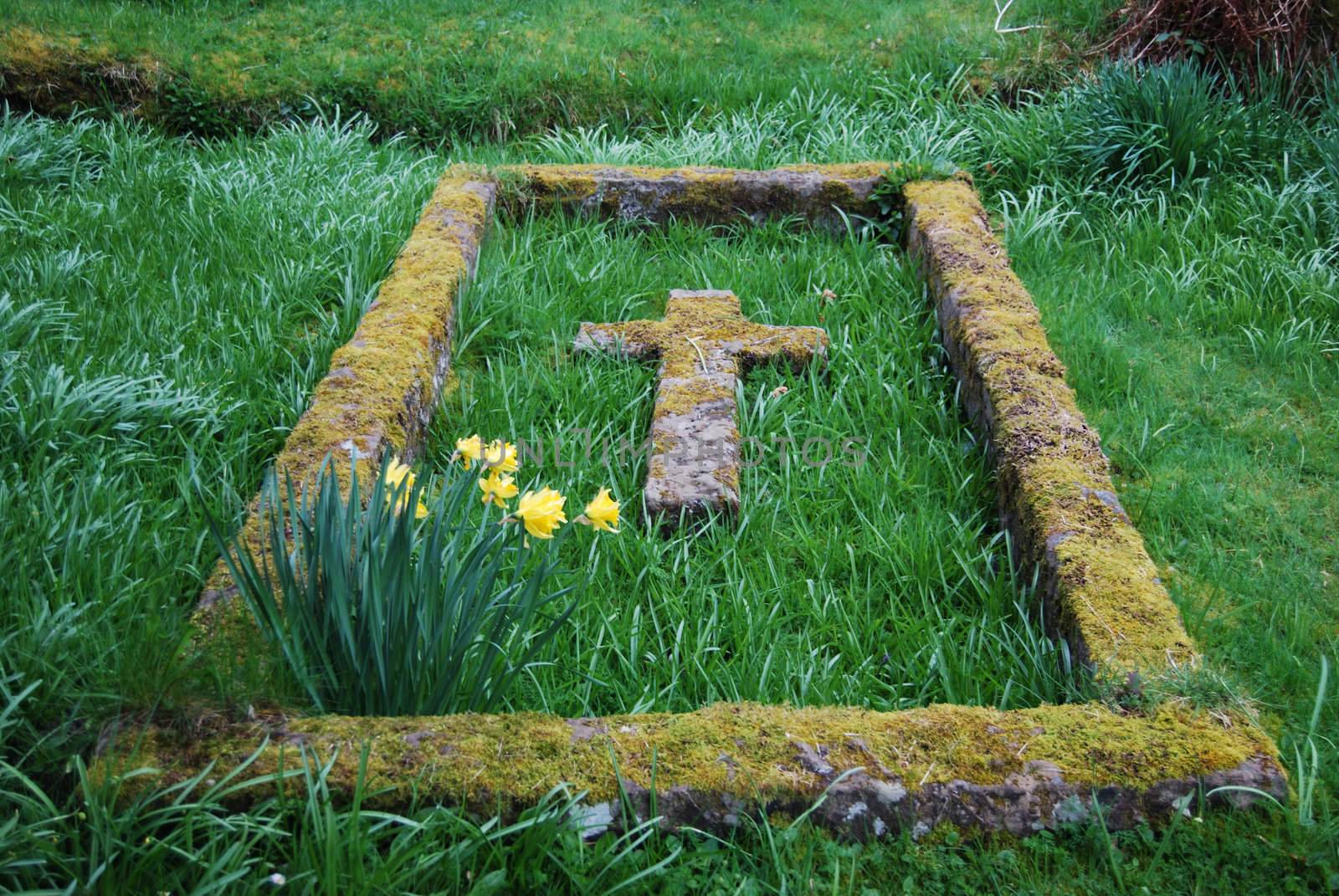 grave at the cemetery in Balquhidder Scotland where Rob Roy McGregor is buried