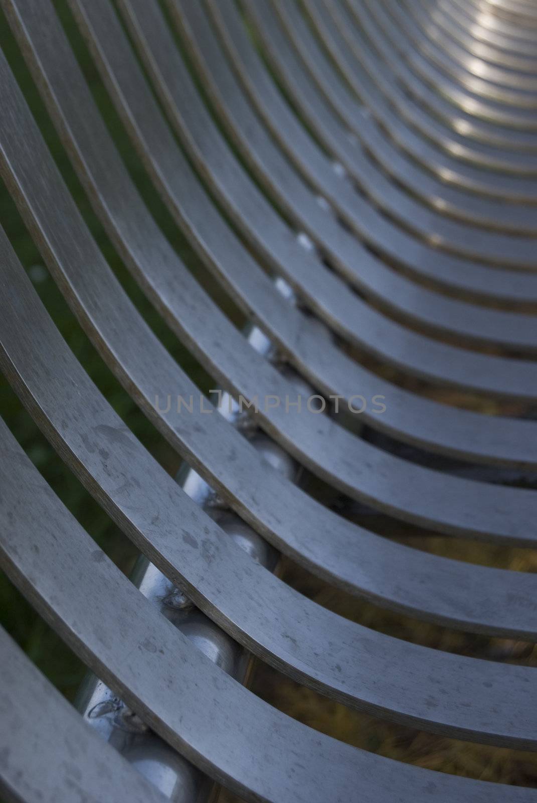 a bench in Kelso close to the river, closeup of the metal construction