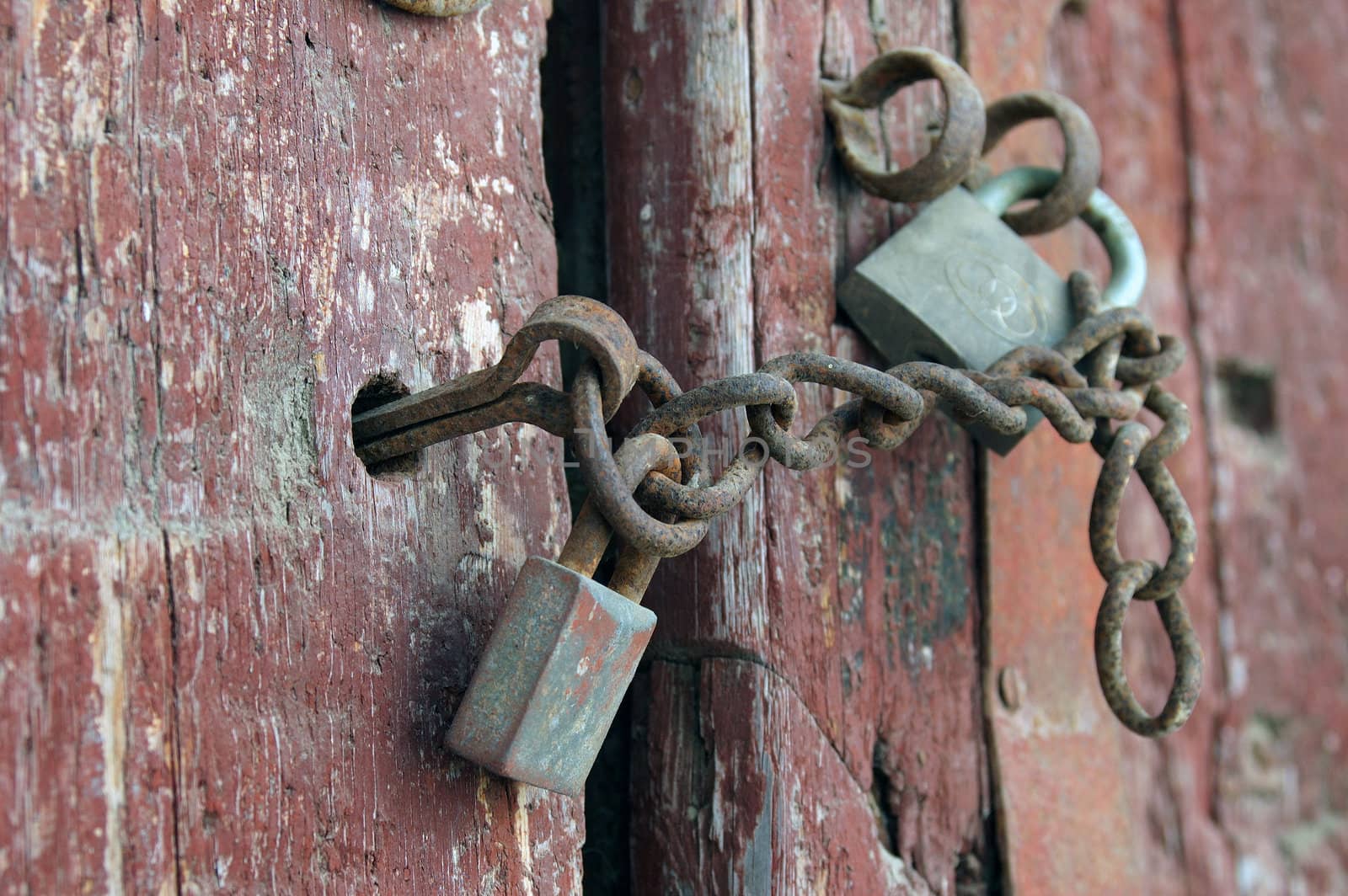 Gates old house with a padlock