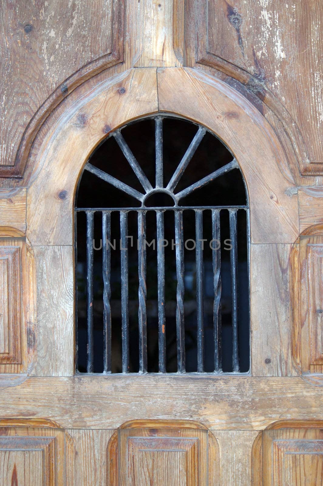Detail of a window grates with a church