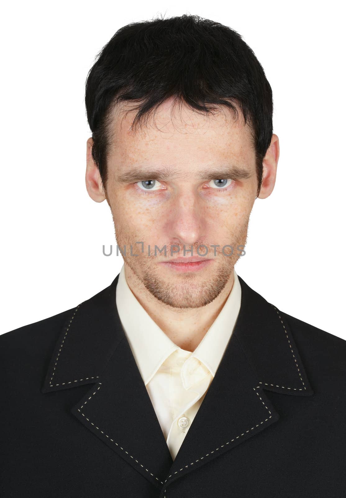 Serious young man with unshaven face on white