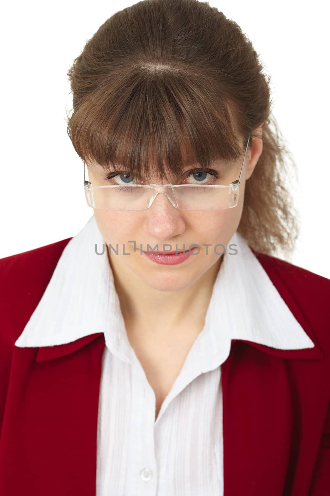 Young woman looking over her spectacles on white