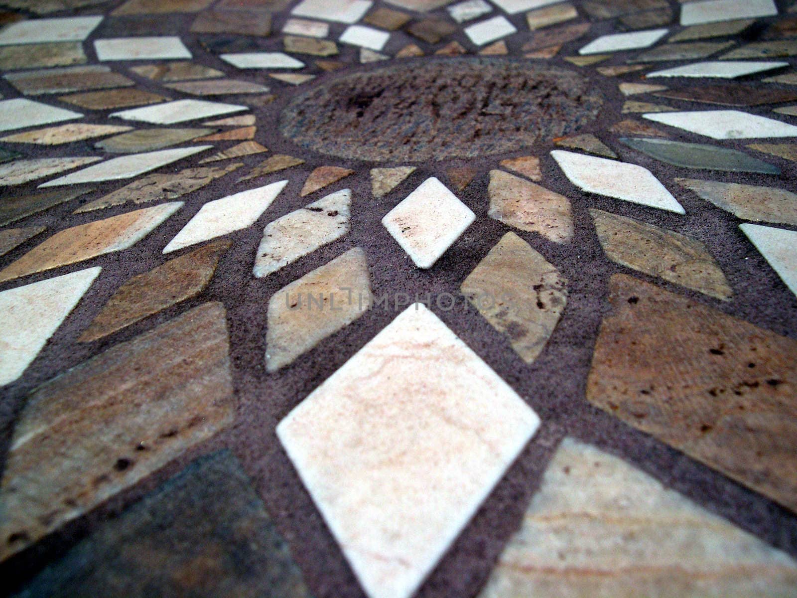 tiles arranged into a mosaic to form a table top