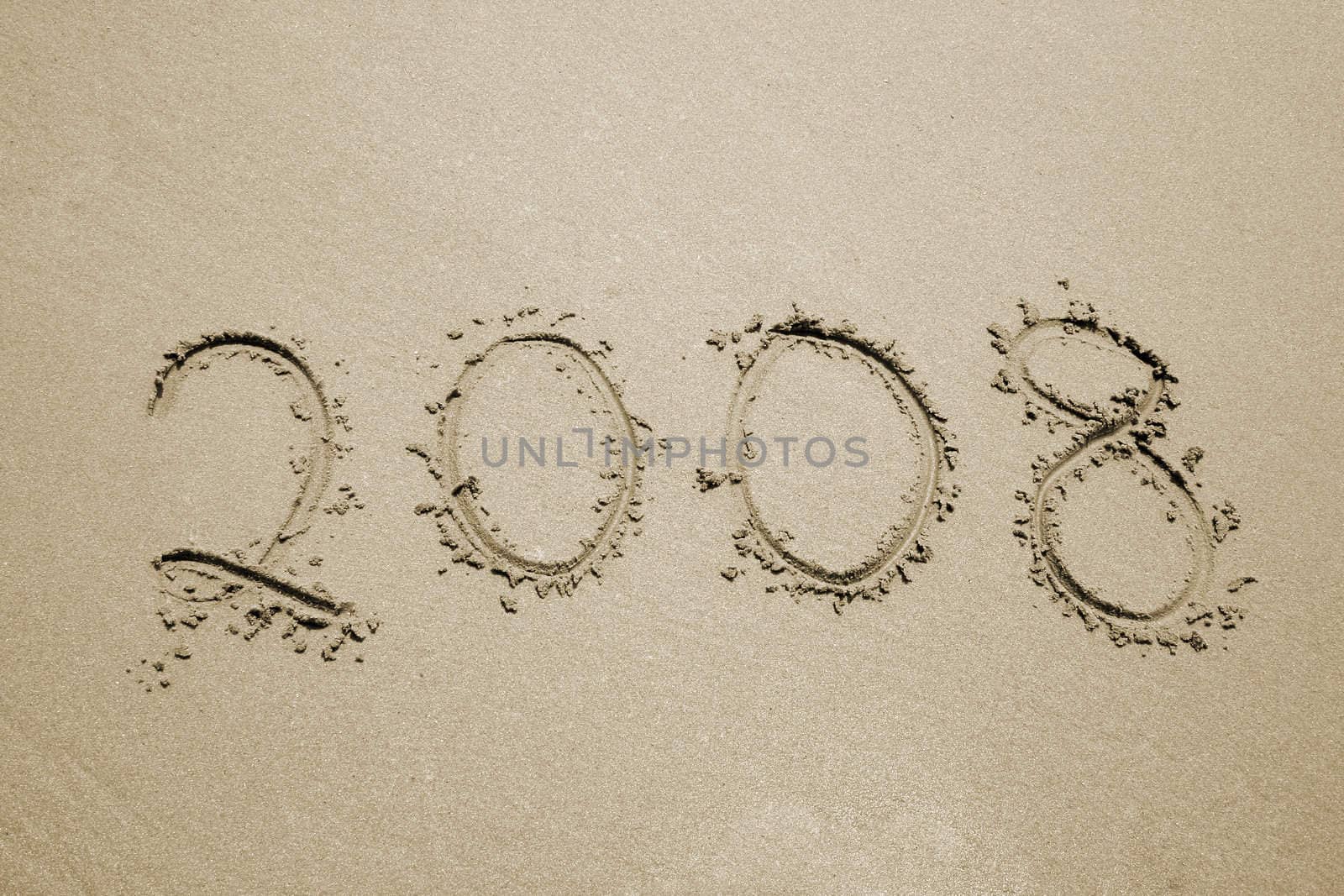 the number 2008 written in the sand