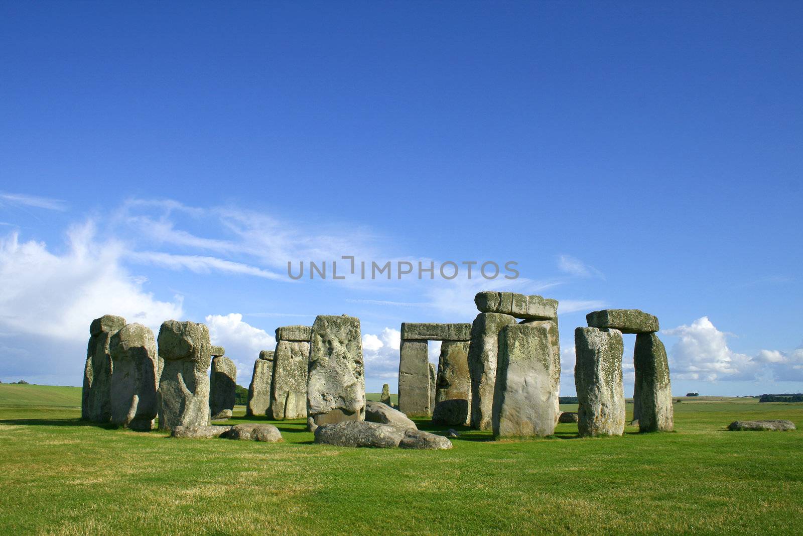 stonehenge with grass and sky