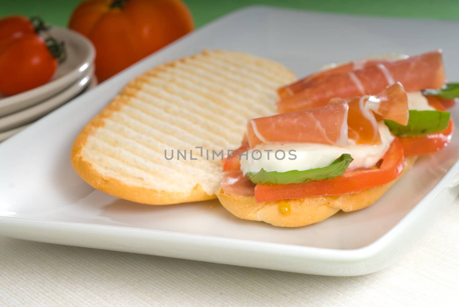 panini sandwich with fresh caprese and parma ham