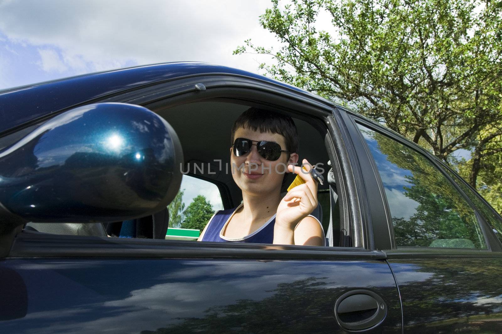 Young man just passed driving test 