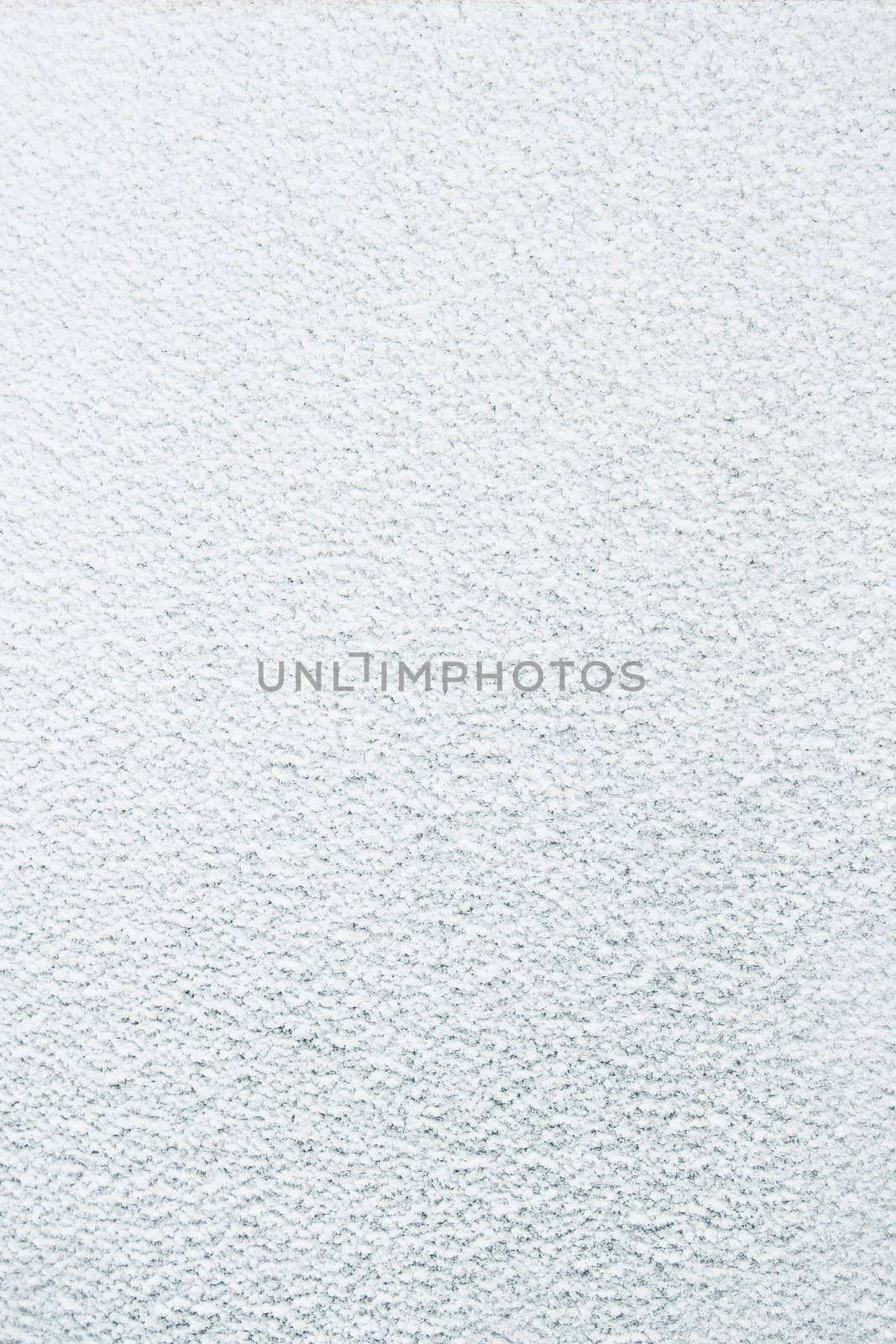 Flat background surface completely covered in frozt and snow