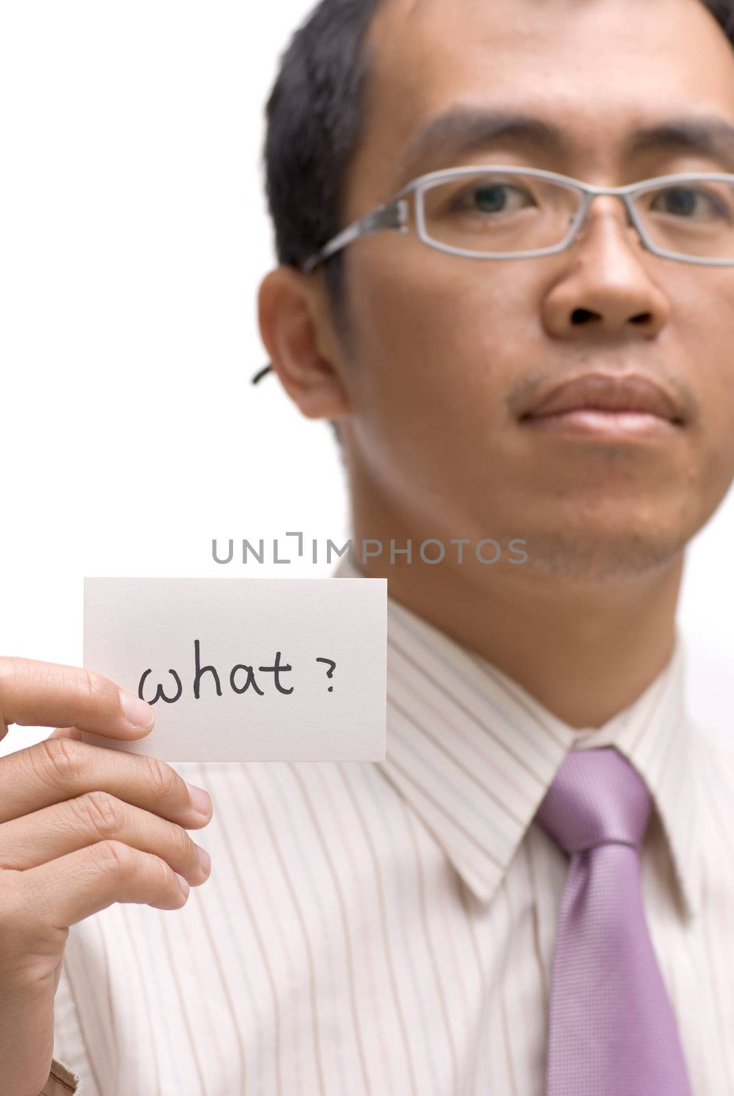 Business man ask what by holding one card on white background. Focus on card.