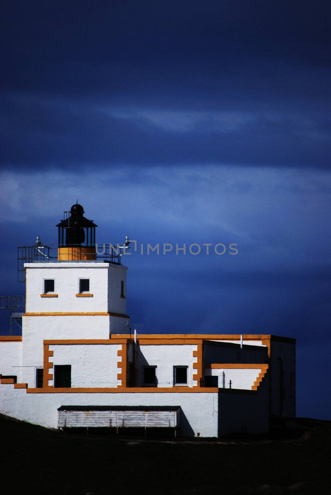 Lighthouse at Dunnet Head, Scotland on a cloudy day