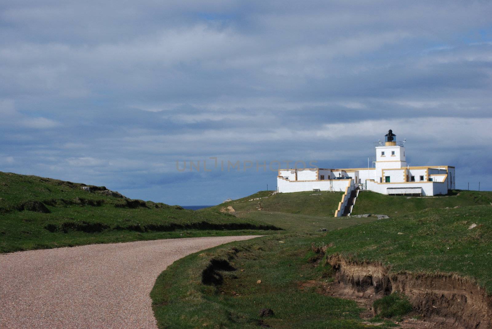 Lighthouse at Dunnet Head, Scotland on a cloudy day