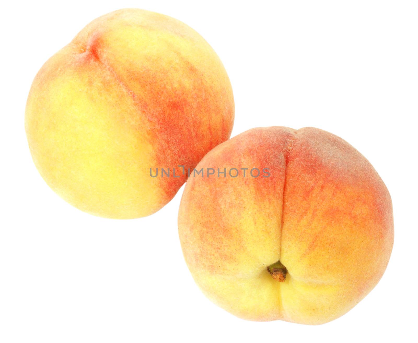 Nice fresh peaches isolated over white with clipping path