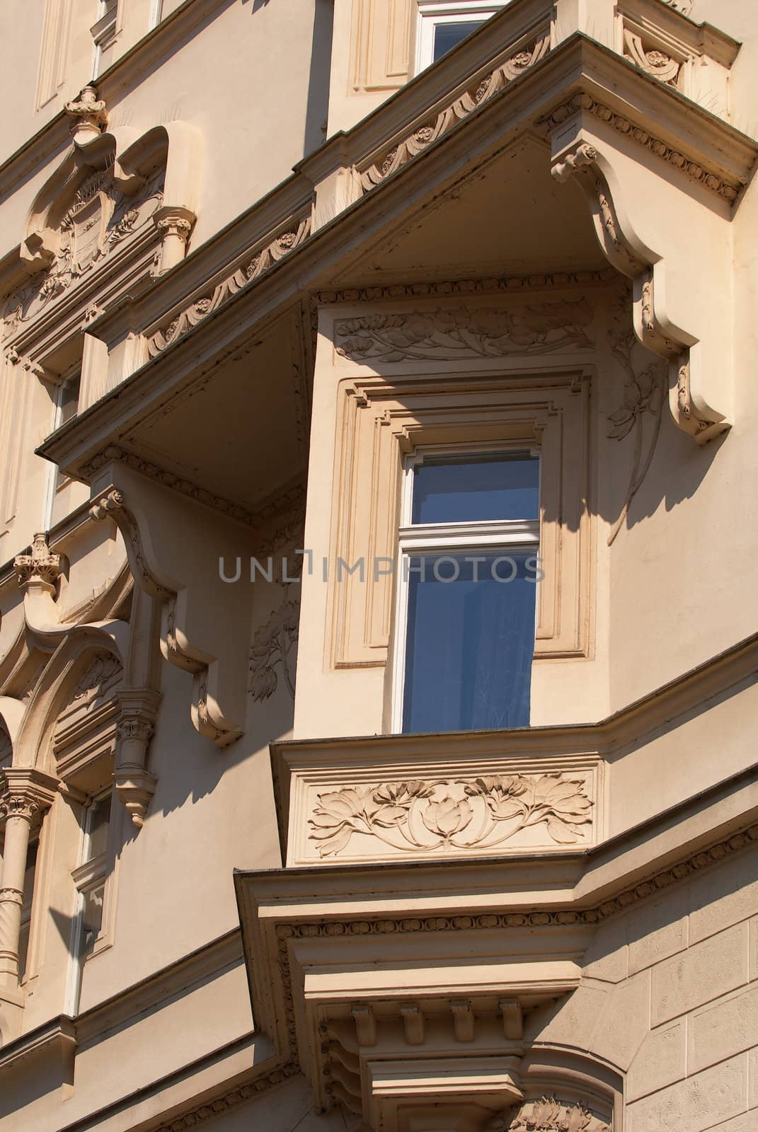 Architectural detail of the building in style of the art-nouveau with window