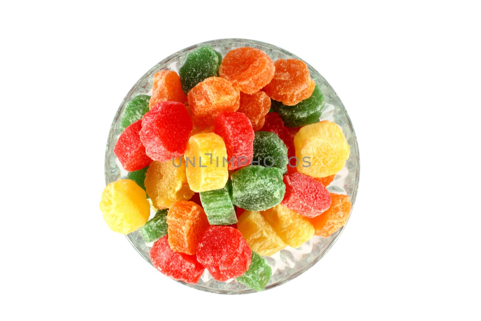Colorful jelly candies in a glass bowl isolated on white