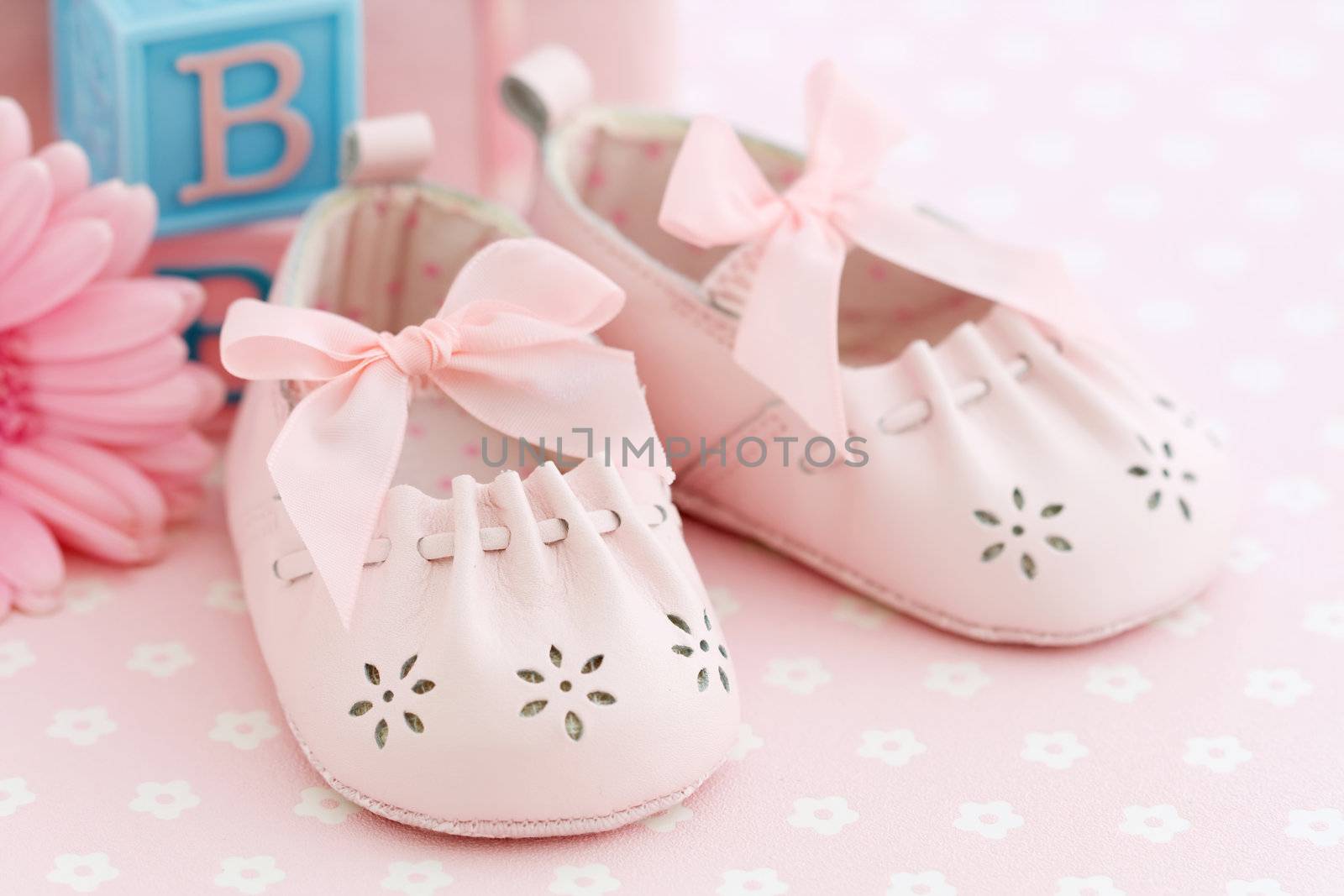 Pink baby shoes for a baby girl