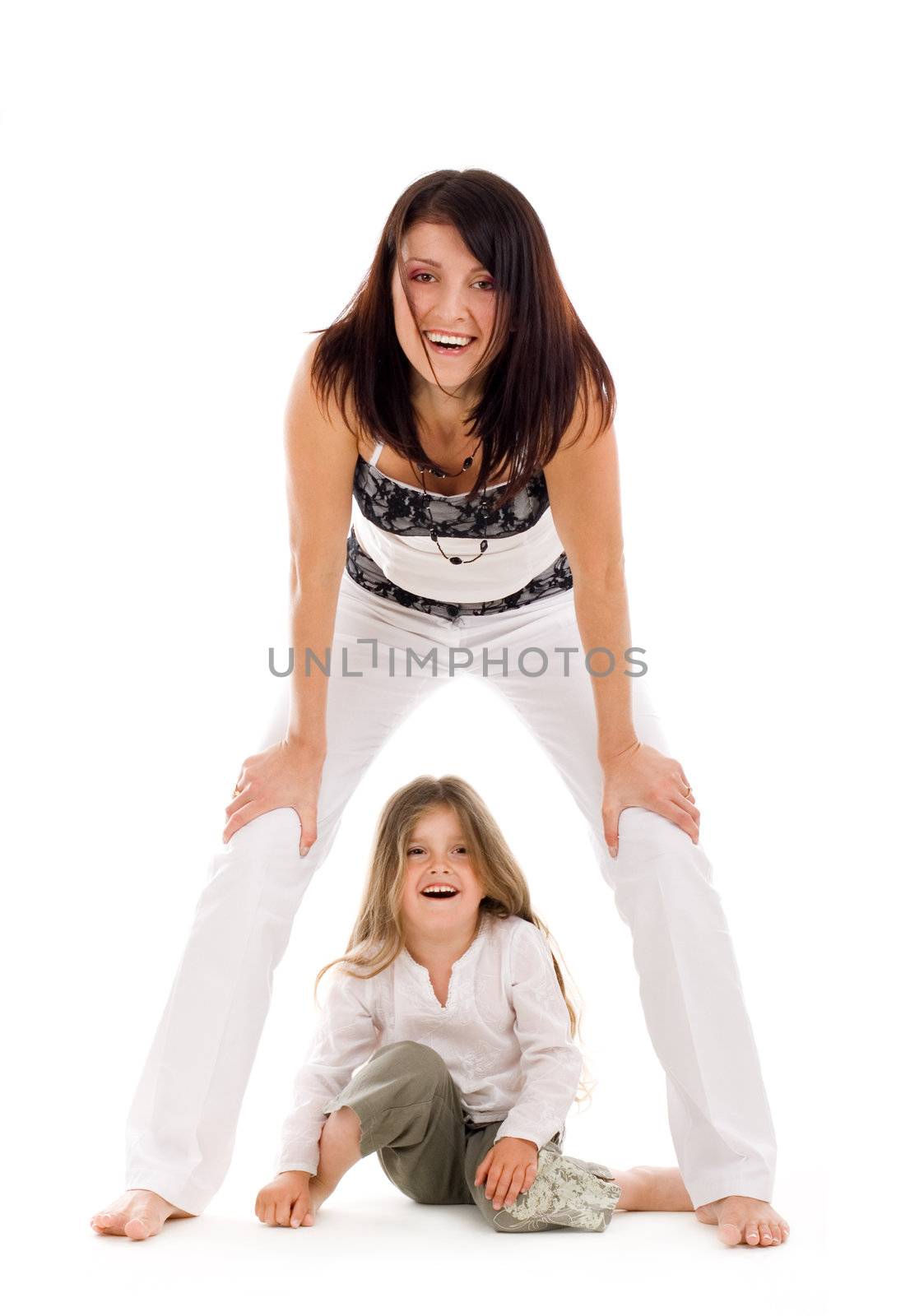 Young happy mother and daughter laughing together