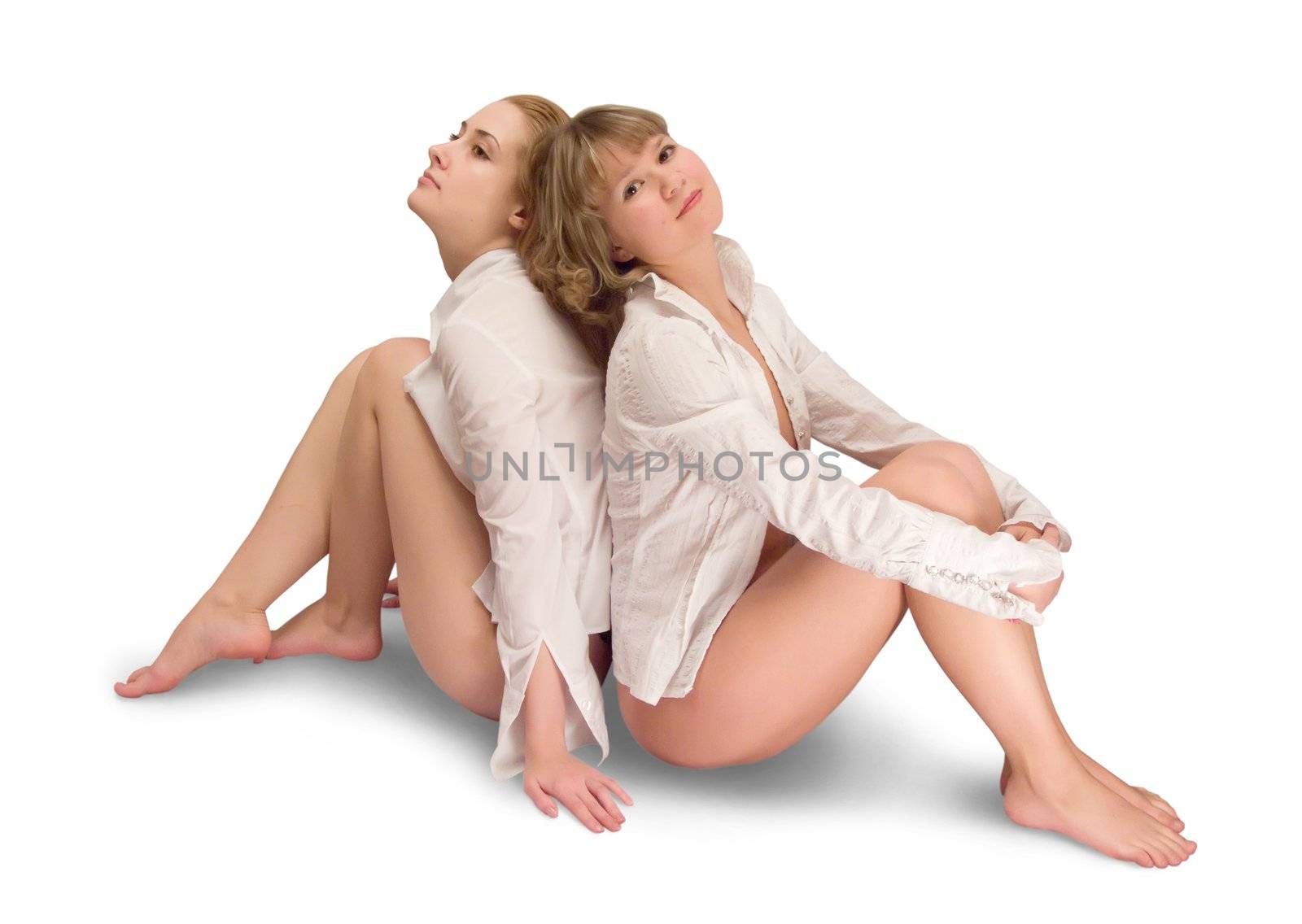 two Young blond girls on white.Isolated