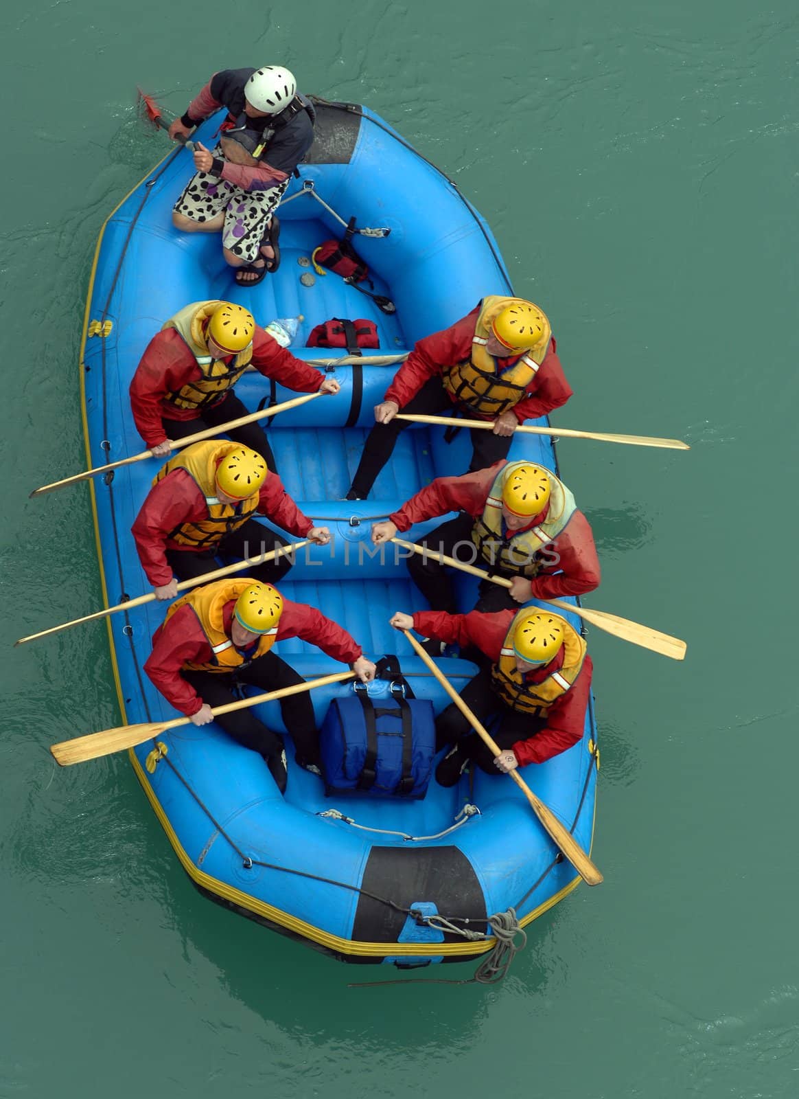 Aerial of photo white water rafters taking off