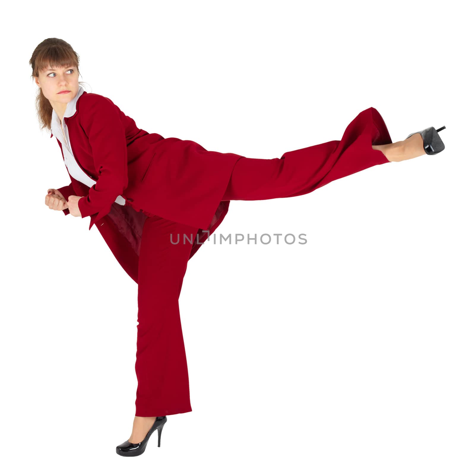 A young woman kicks back, isolated on a white background