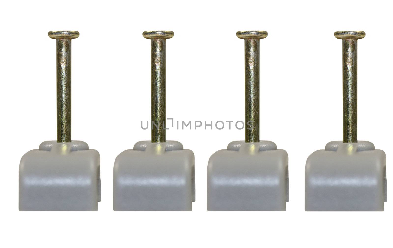 Electrical cable or wire clips in grey, isolated on a white background