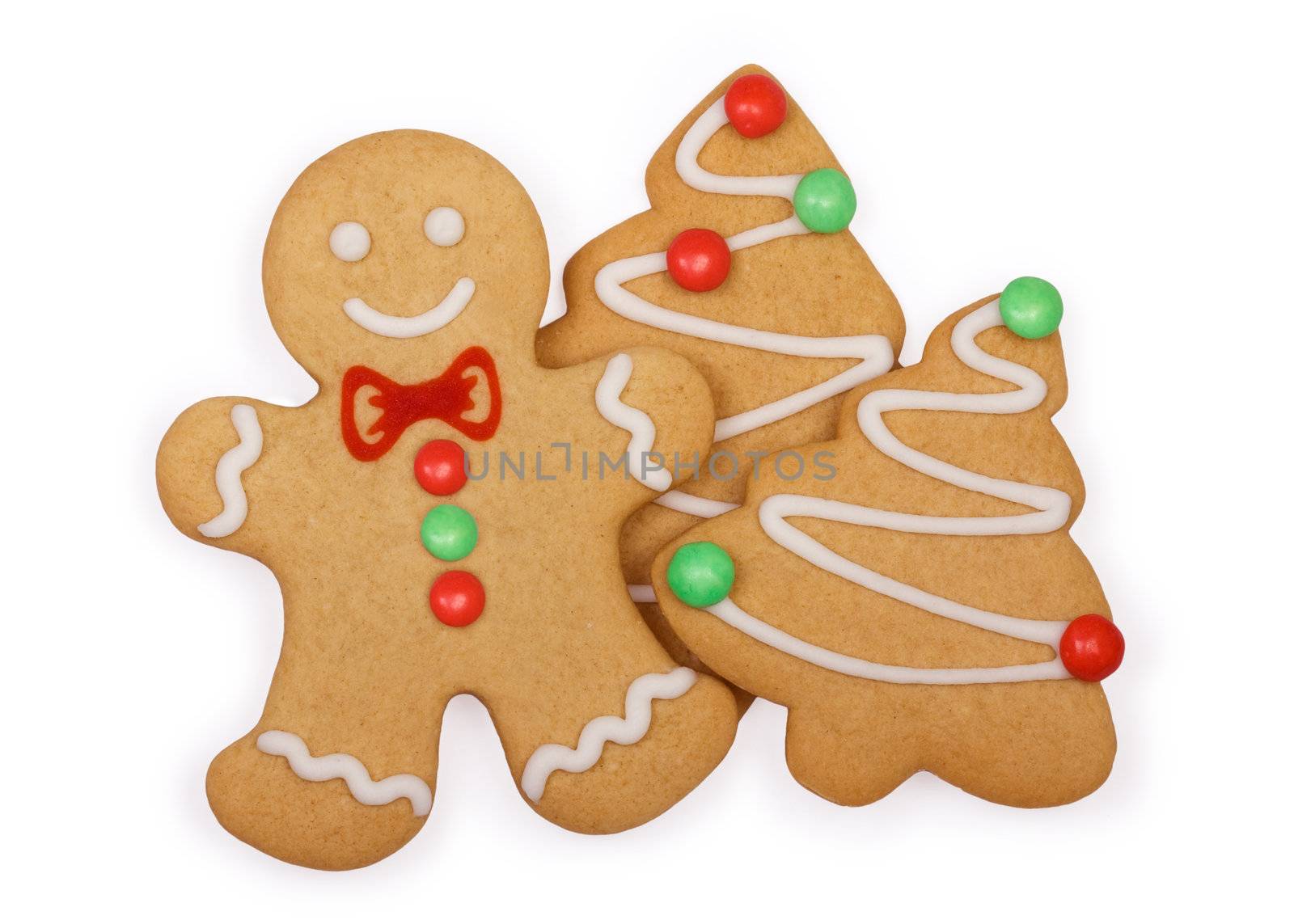 Gingerbread man with gingerbread Christmas tree cookies