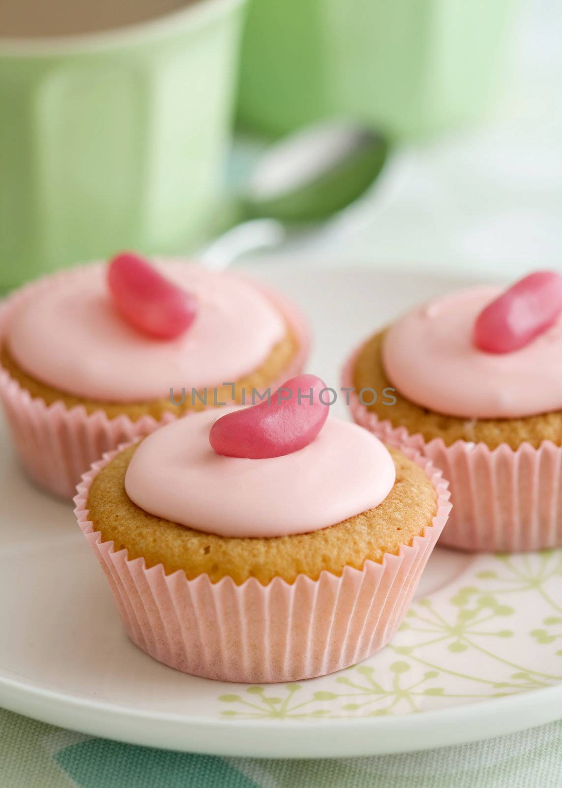 Cupcakes decorated with frosting and jellybeans