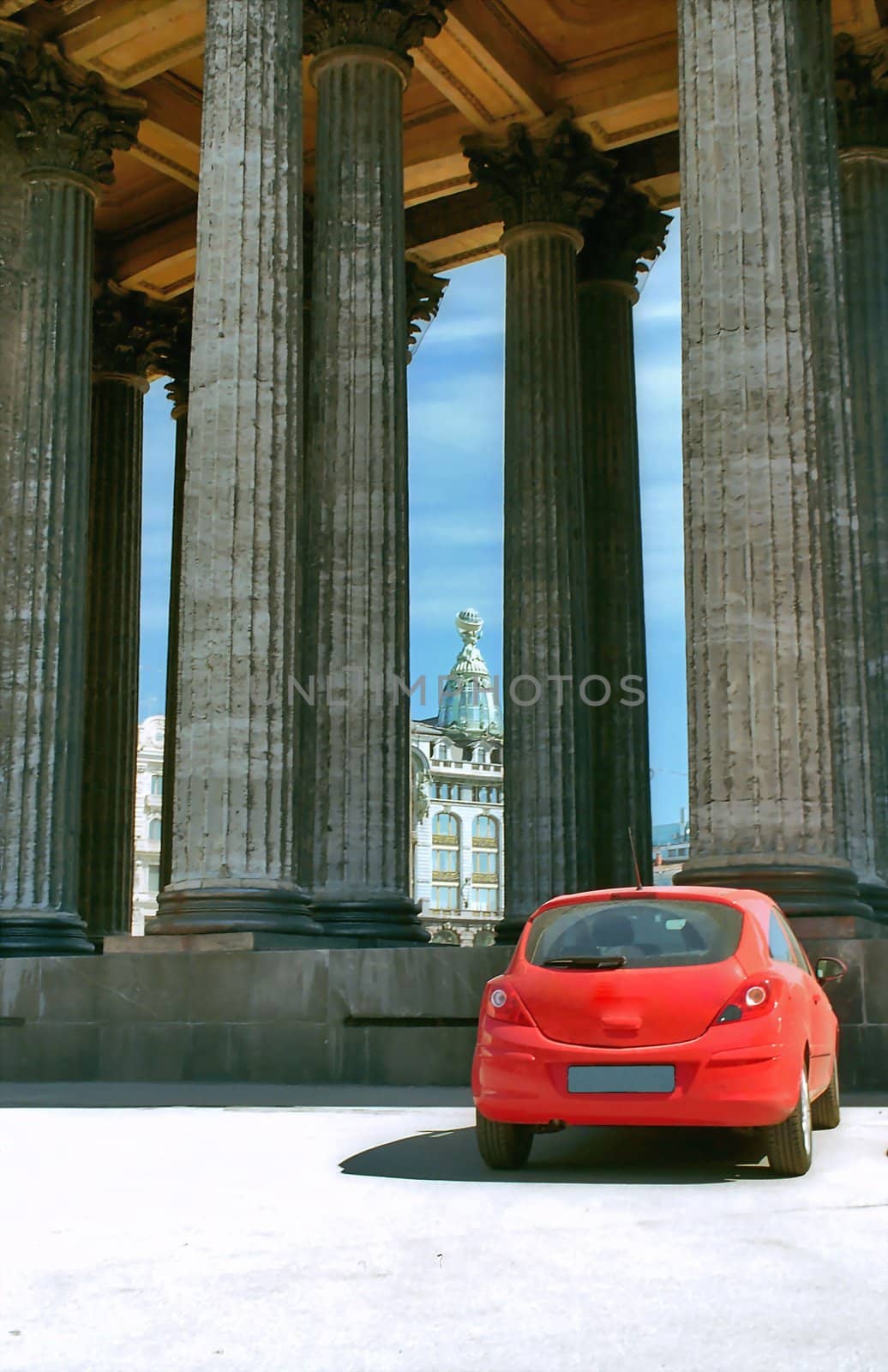 Classical porticos and red car