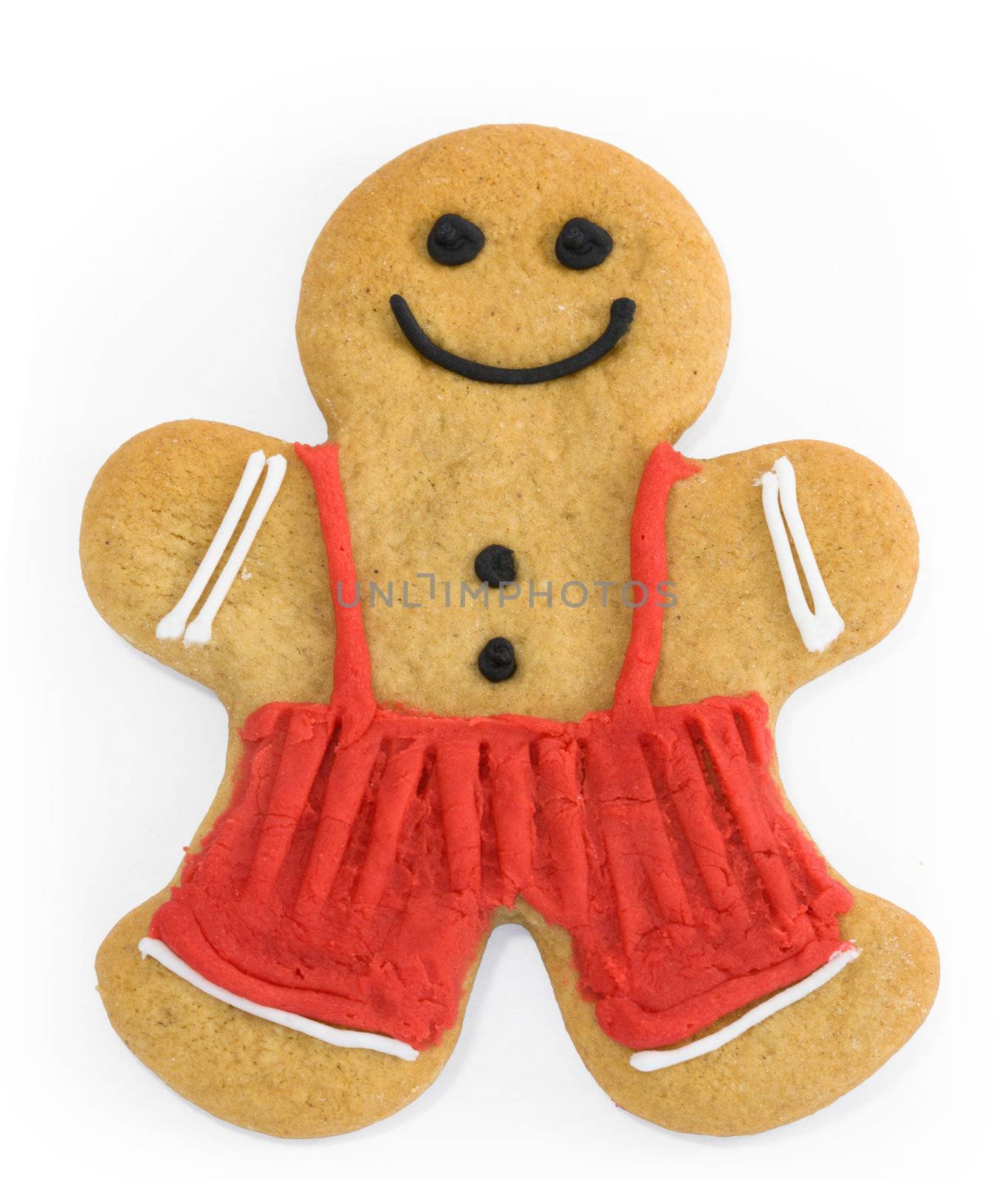 Smiling gingerbread man with dungarees and buttons