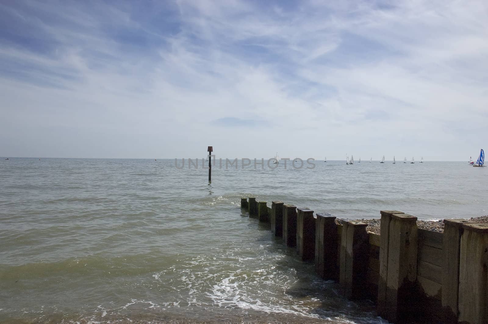 Groyne leading into the sea on a cold day