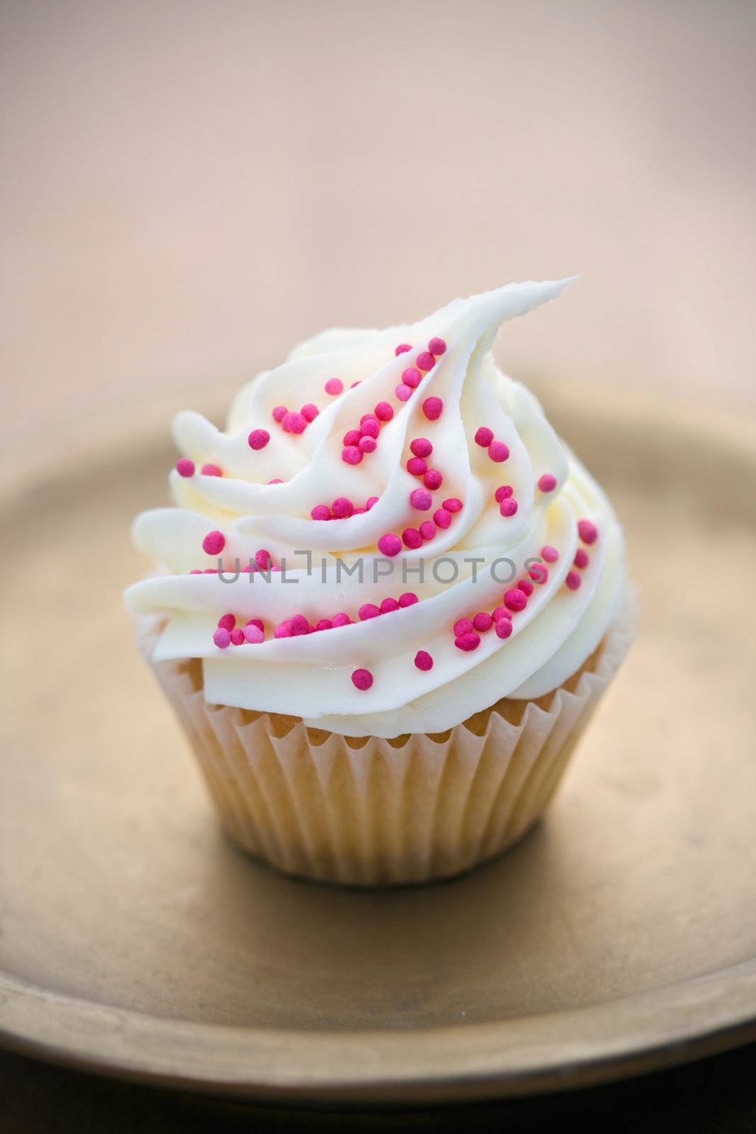 Cupcake on a gold plate