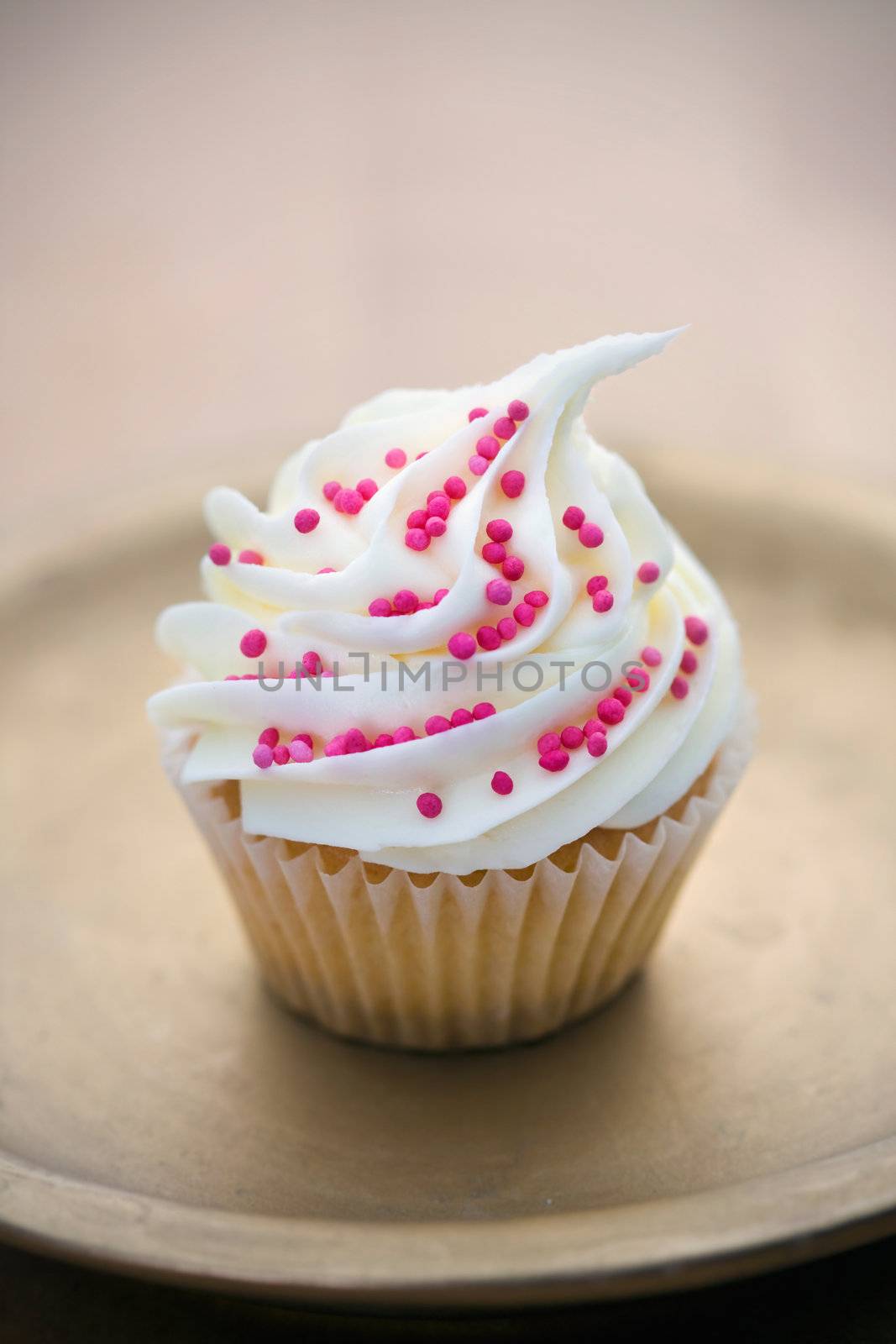 Cupcake on a gold plate