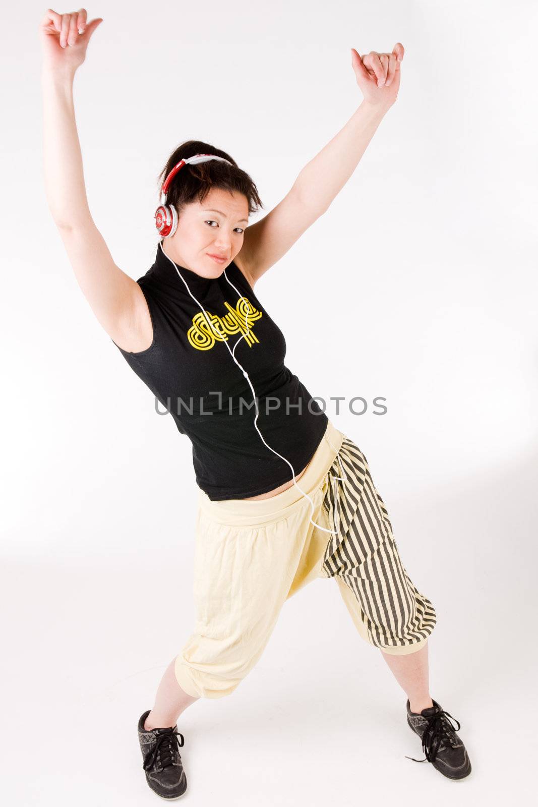 Young girl enjoying the music and dance on it