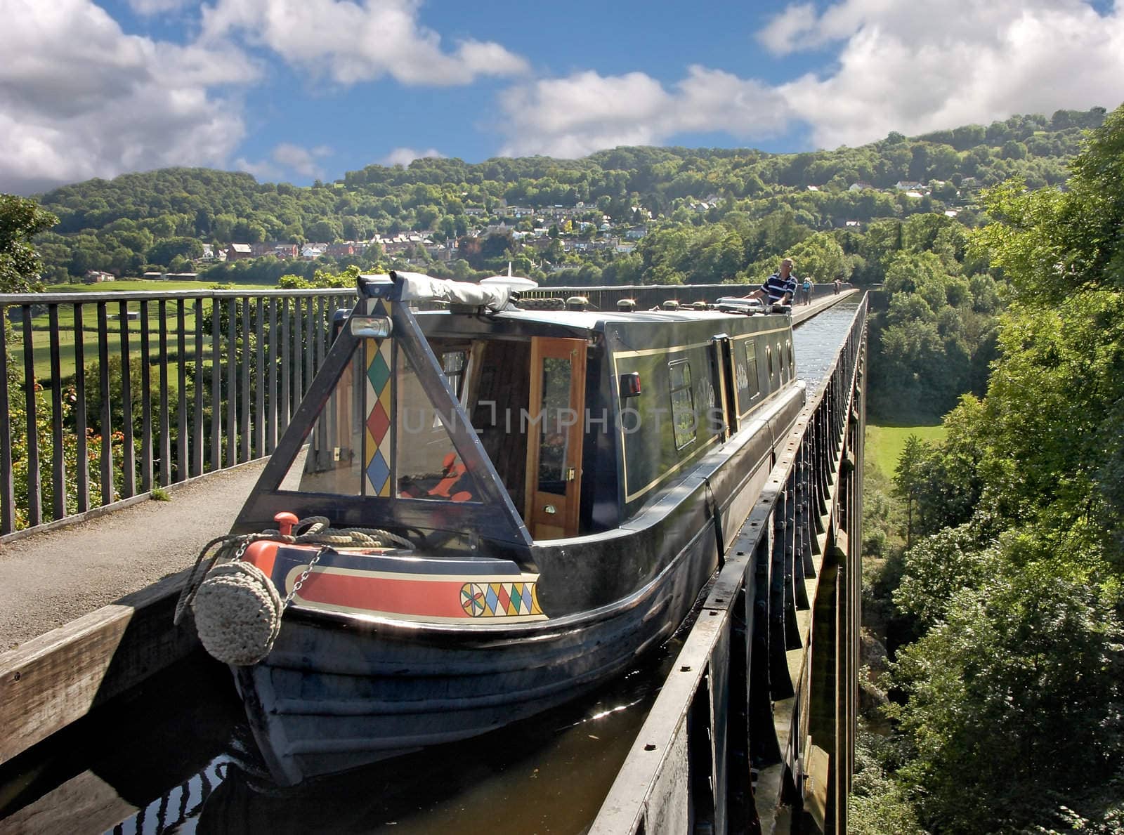 A narrowboat crossing the 120 foot high aqueduct on the Shropshire Union canal near Llangollan in Wales.