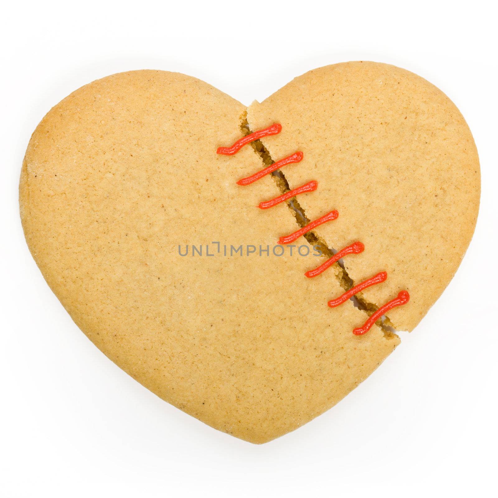 Gingerbread cookie in the shape of a broken heart
