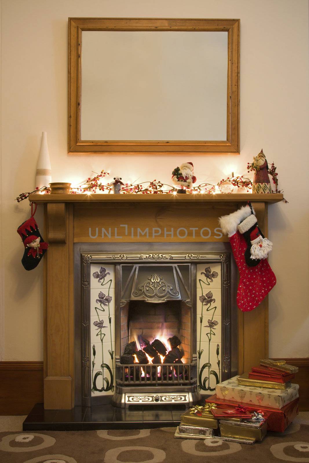 Victorian style fireplace ready for Christmas