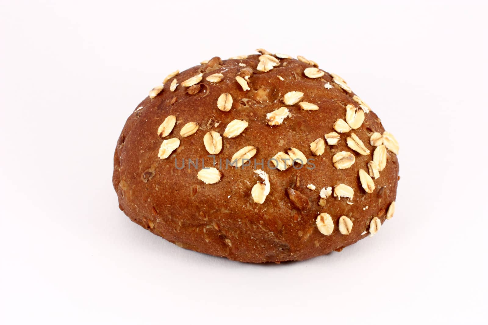 Pastry with oat seeds isolated