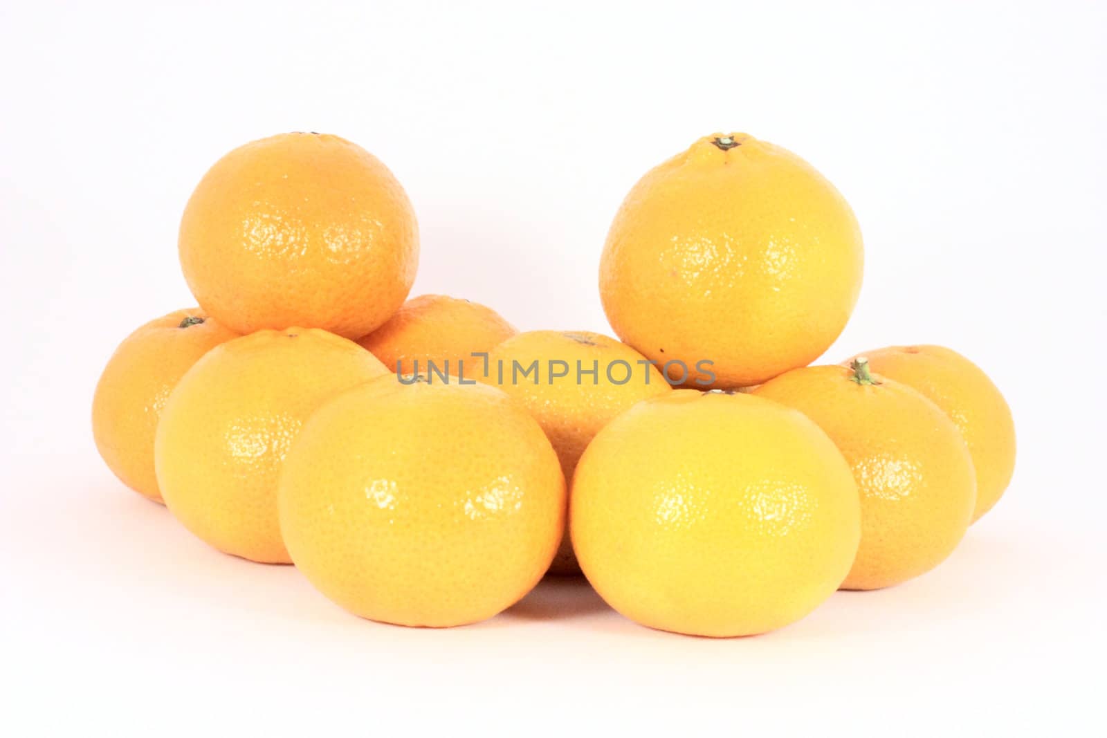 stack of mandarines isolated on white