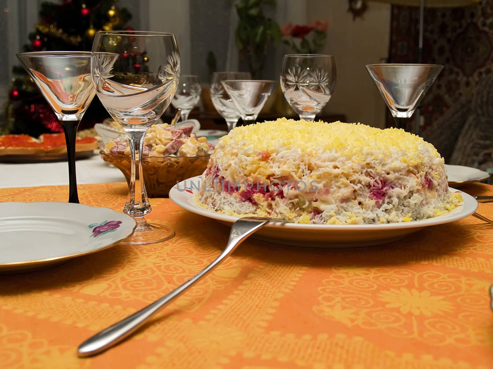 Table covered for a celebratory dinner. Tasty salad