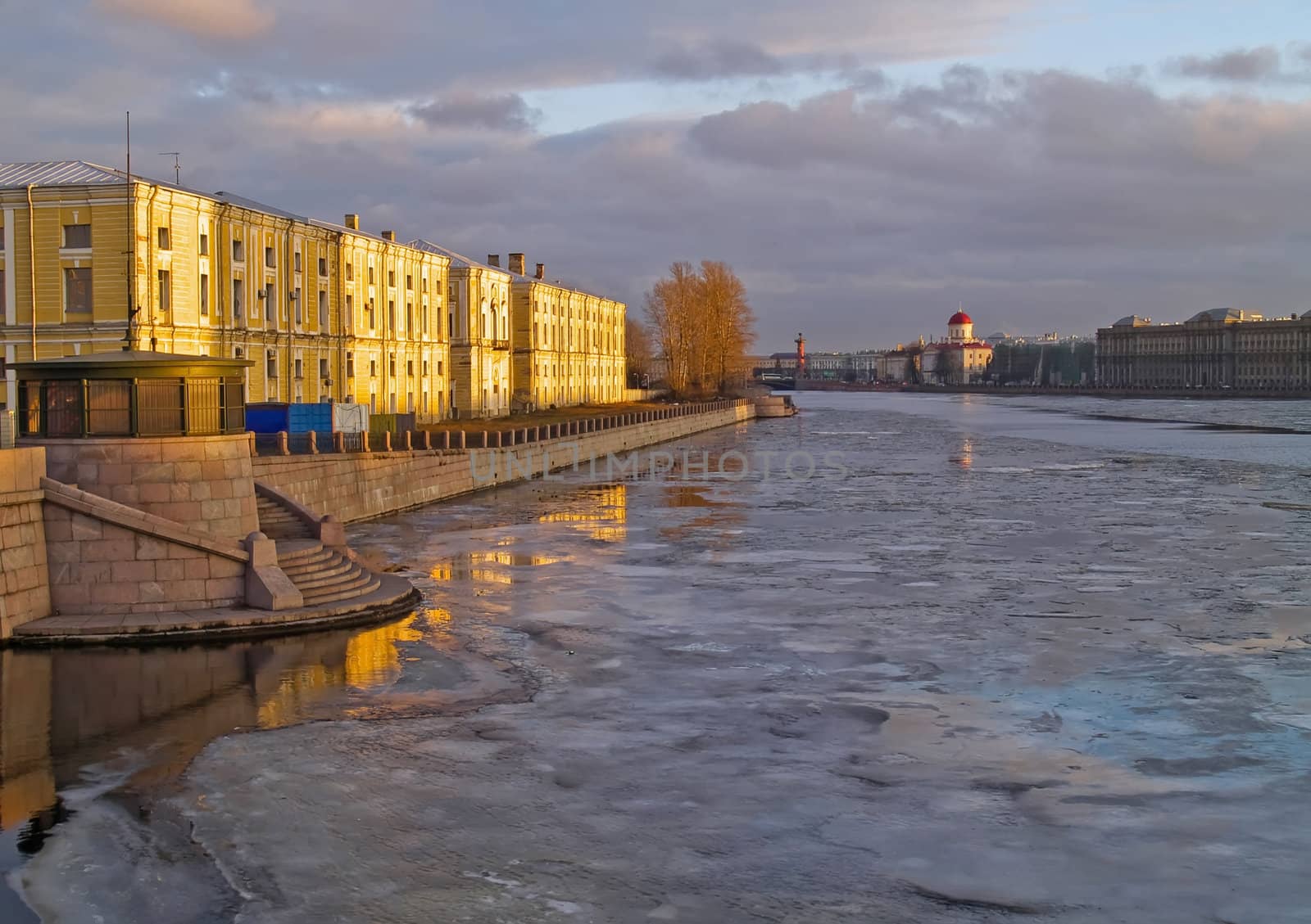 Sunset on the Neva River, Russia. Spring time ice drift
