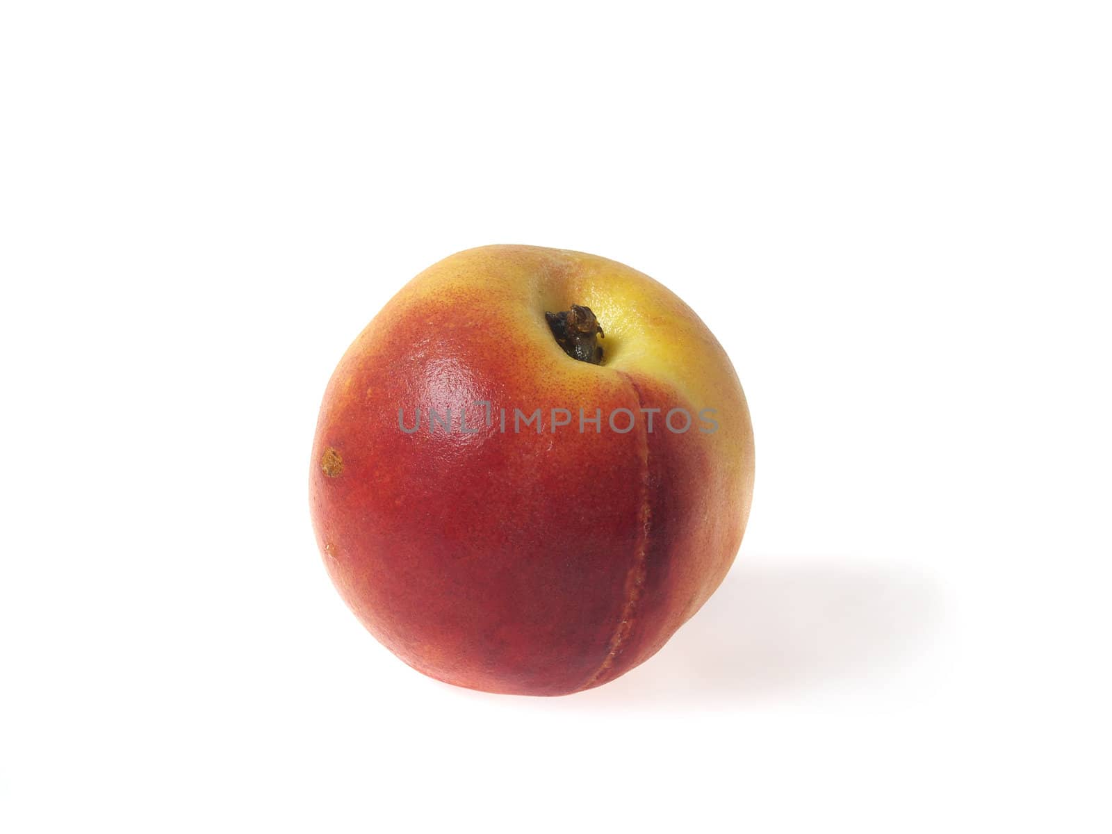 Half of tasty juicy peaches on a white background whith clipping mask. Shadows is not included in clipping mask