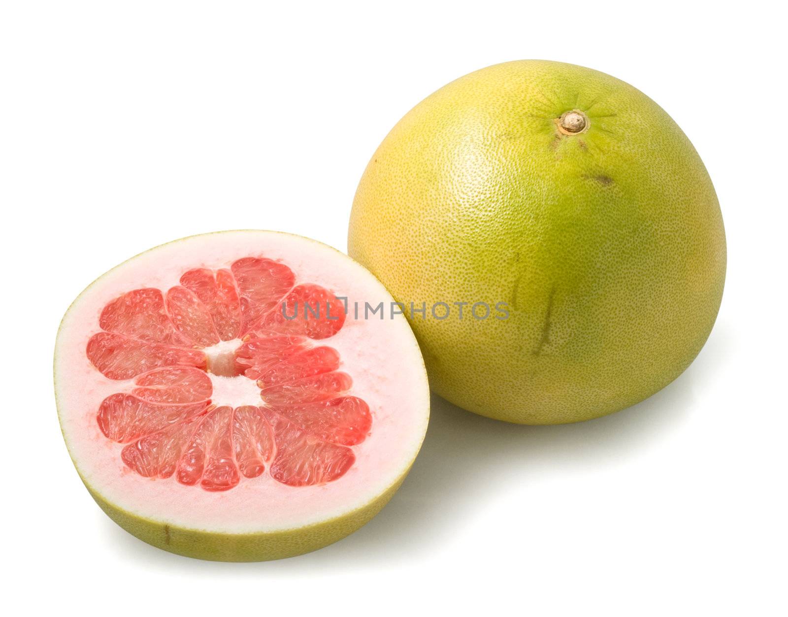 Pomelo fruit and half isolated on te white background