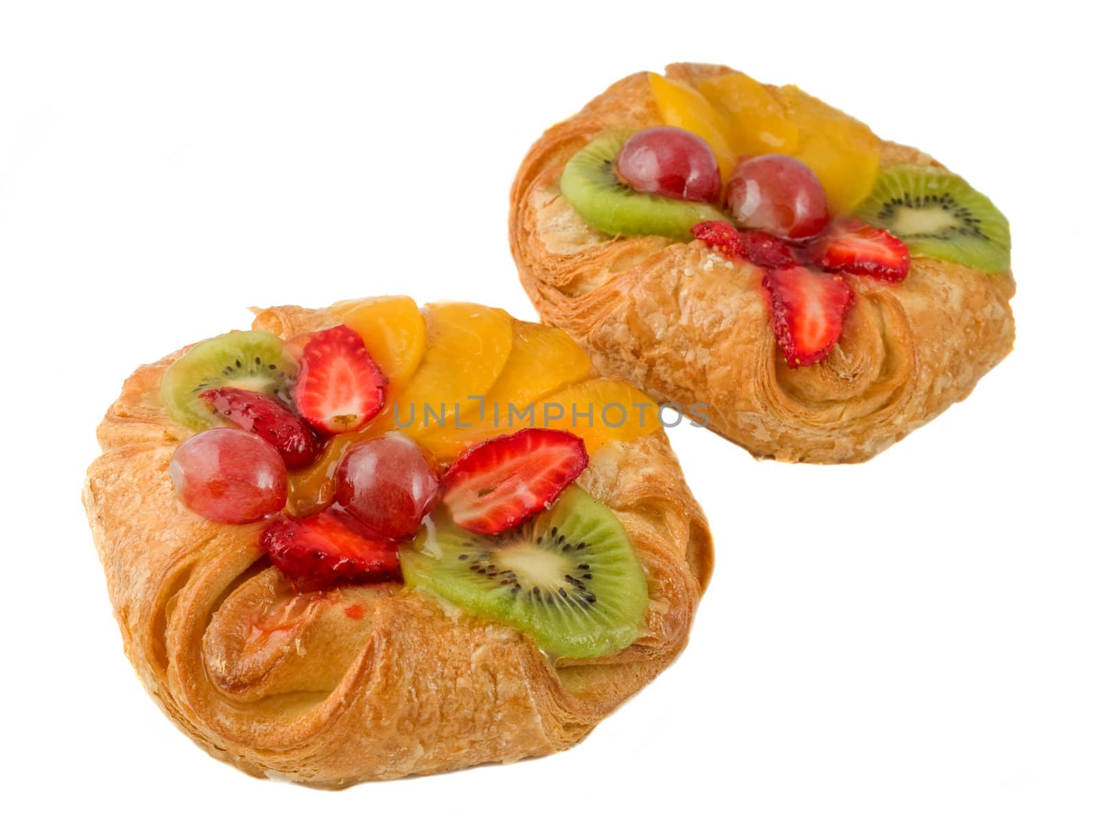 Rich rolls with fruit isolated on a white background