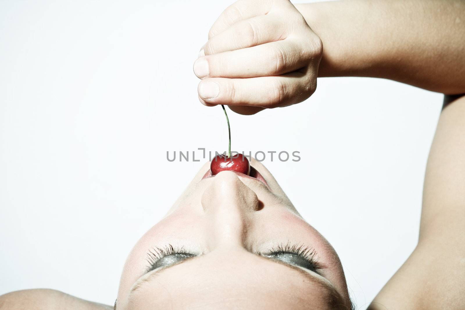 Woman Tasting A Cherry by nfx702