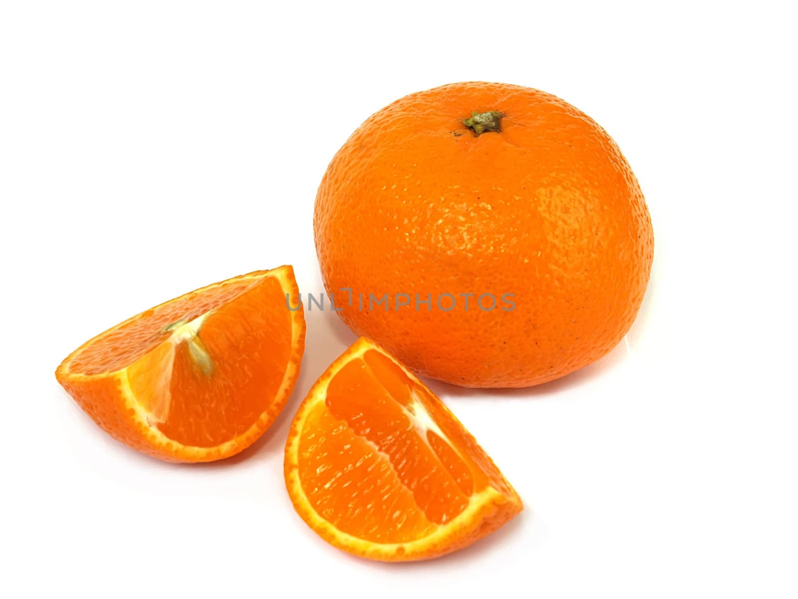 Isolated lobules of tangerine with clipping path. Shadow is not included with the clipping path.