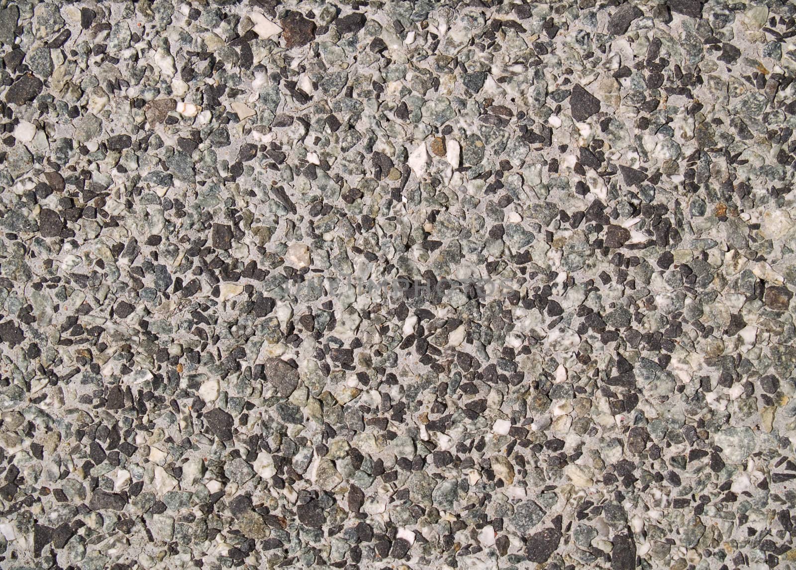 Tile covered by a granite crumb.