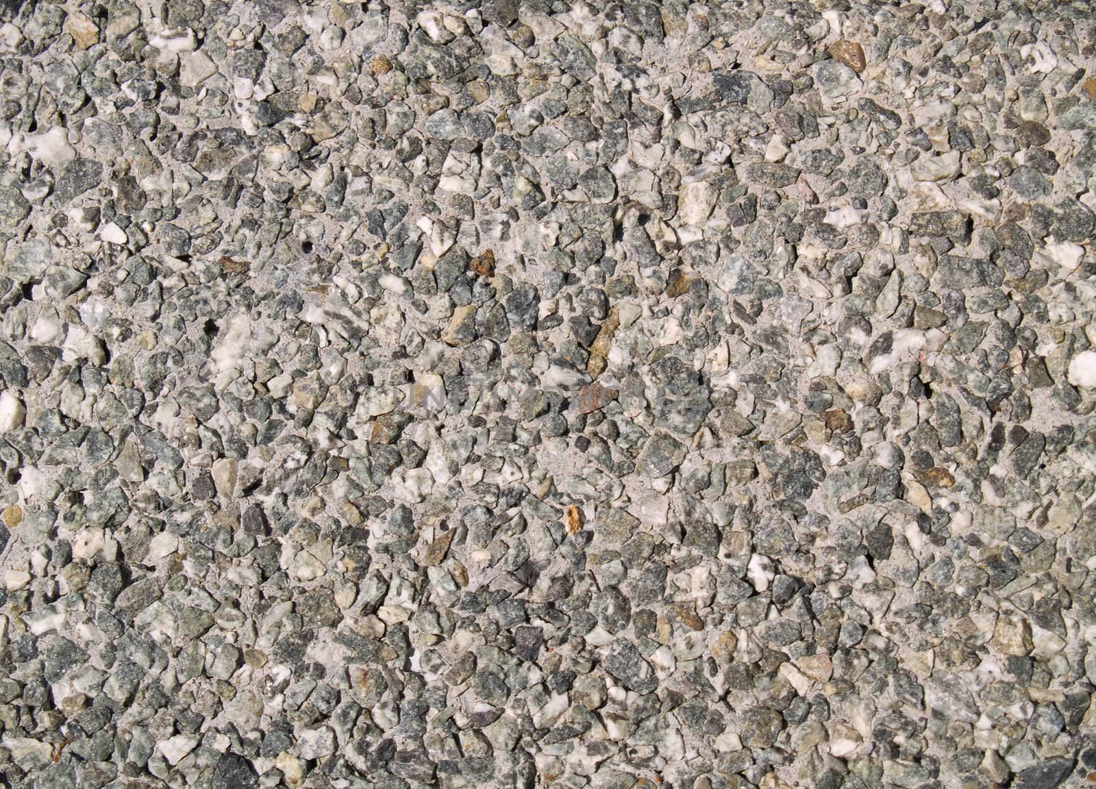 Tile covered by a granite crumb.